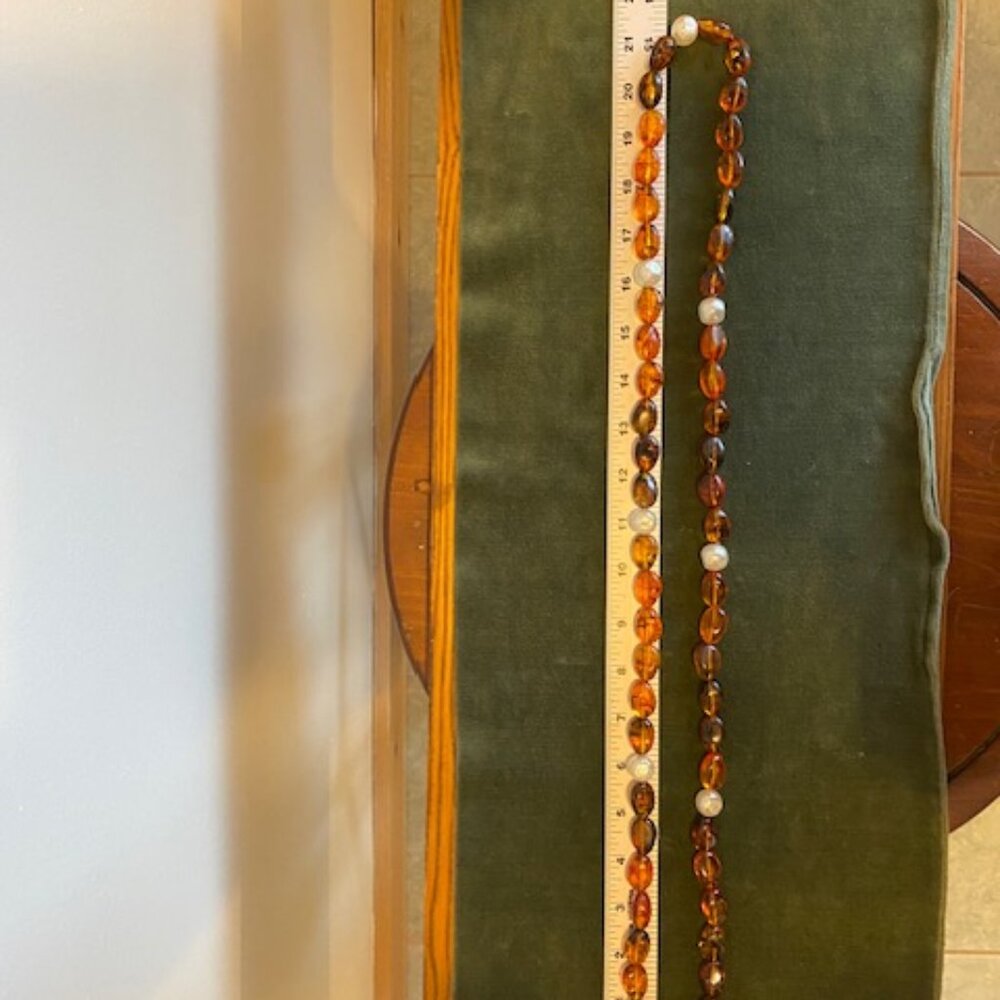 True Amber complete with insects and freshwater pearls necklace